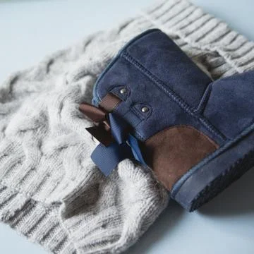 White uggs, side and top views Stock Photos