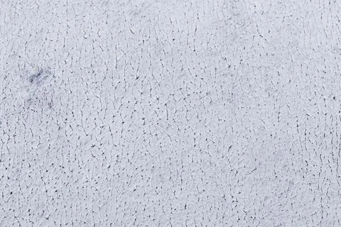 White uneven rough background with weak toning Stock Photos