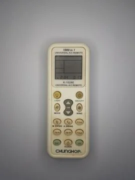 A white universal air conditioner remote from the top view Stock Photos