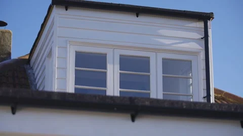 White upper windows of house Stock Footage 250937256