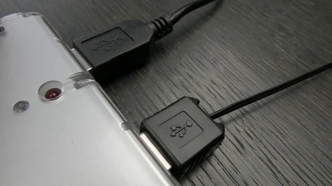 White USB cable connected to a hub. Online and Connection concept. Video stock 73928833