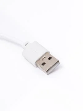 White USB cable connector on white background Stock Photos