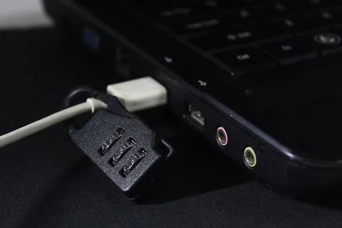 White USB cable with padlock Фото