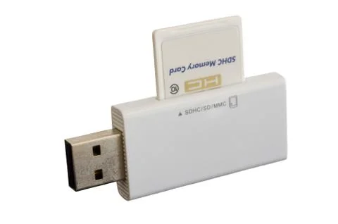 White usb card reader with inserted sdhc card Foto stock
