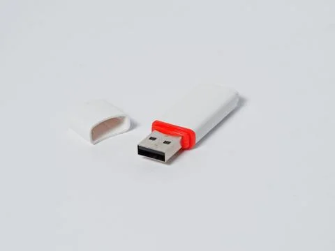 White usb flash drive isolated with a red stripe on the white background Stock Photos