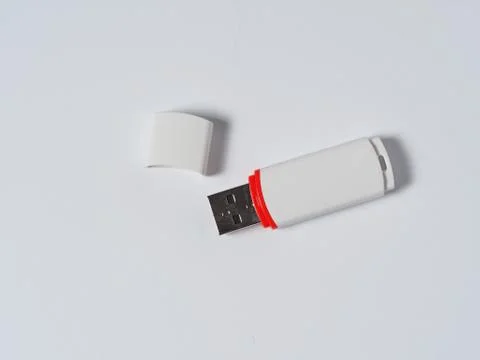 White usb flash drive isolated with a red stripe on the white background Stock Photos
