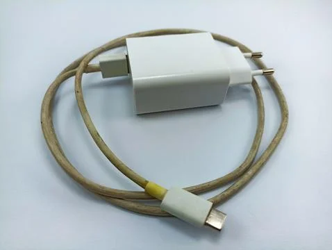 White usb type c smartphone charger on white background Stock Photos