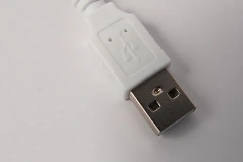 White Usb Type a Connector with Embossed Symbol Macro Shot on Plain White B.. Stock Photos