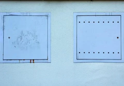 White Utility Panels on Wall Фото