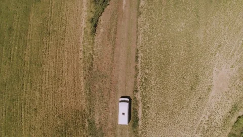 White Van on Dirt Road Stock Footage 78079782