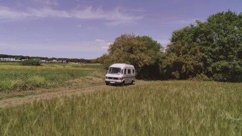 White Van drives in wheat field 스톡 동영상 78089509