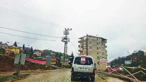 A white van driving down a dirt road Stock Footage 273015538