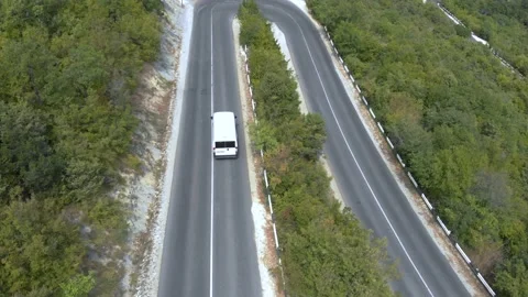 White van driving down the road 4K Stock Footage 207807568