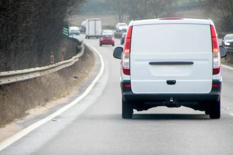 White Van On The Road Stock Photos