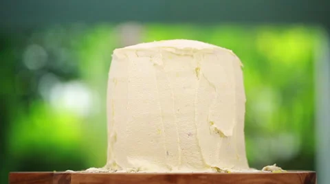 A white vanilla cake on turntable Stock Footage 51928343