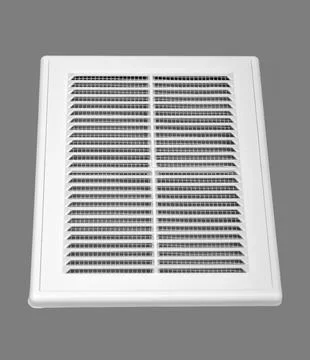 White ventilation grate on a gray background. Rectangular shape, plastic ma.. Stock Photos