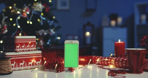 White vertical smartphone with chroma key screen being on the desk with wrapped Stock Footage 99804077