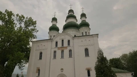 White Wall and Green Domes of Cathedral Church Exterior Orthodox Religious Stock Footage 71633488