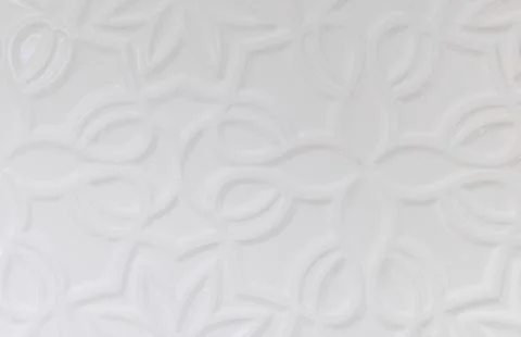 White wall background with various forms of ornamentation Stock Photos