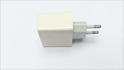 White Wall Charger Adapter with EU Plug on White Background Stock Footage 334981865