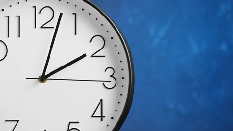 White wall clock on blue background. Time concept. Stock Footage 150506758