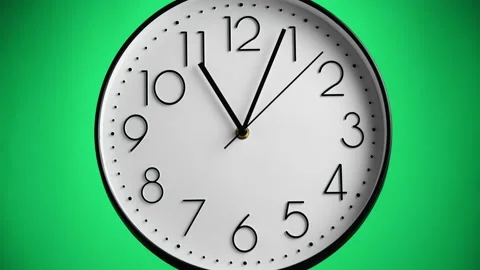 White wall clock on green background. One hour to 12, time-lapse. Time concep Stock Footage 149465649