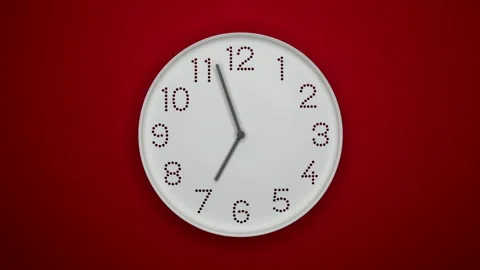 A White Wall Clock On Red Background With A Time Of 7.00 Am Or Pm. A Gray Or Gre Stock Footage 221282499