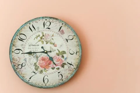 White Wall clock with vintage dials on the pink wall Stock Photos