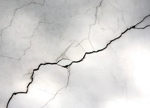 White wall with cracks Stock-Fotos