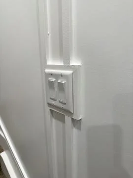 White Wall Light Switch In Modern Interior Stock Photos