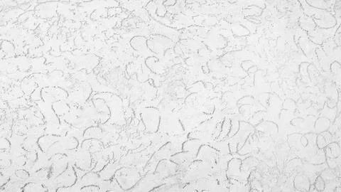 A white wall with a pattern of lines and circles. The wall is very plain and  Foto stock