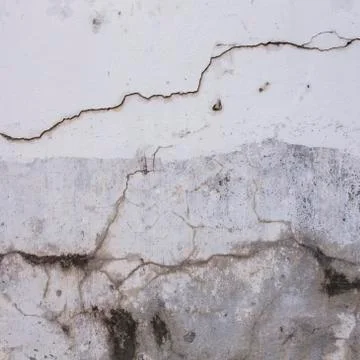 White wall plaster cracked Stock Photos