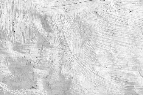 White wall with plastering layer, relief pattern, flat background texture 库存照片