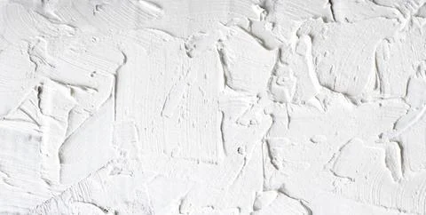 White wall putty texture, rough grunge close-up background in banner or panorama Stock Photos