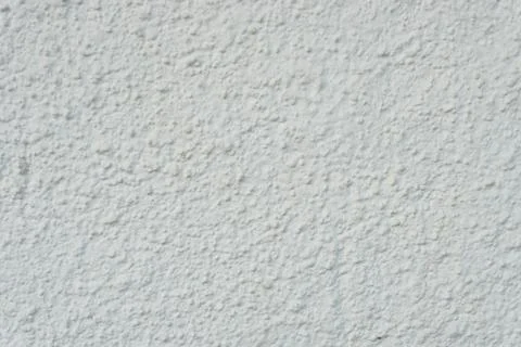 White wall texture for background. Close up view. Stock Photos