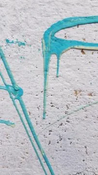 White wall texture with light blue paint drips and strokes Stock Photos