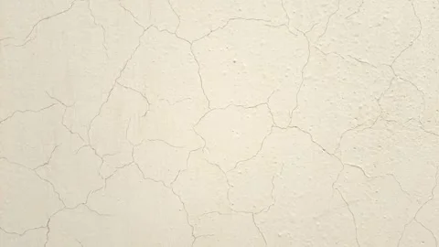 Off white wall texture with paint cracks moving down, paper texture background Stock Footage 279434600