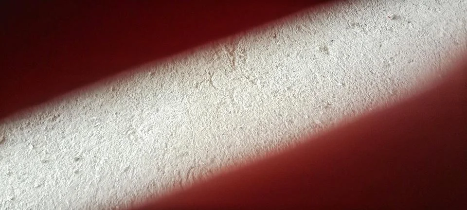 White wall texture with red light and shadow Stock Photos