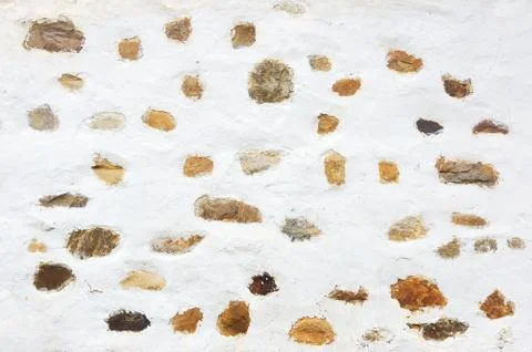 White wall texture with rustic stones Stock Photos