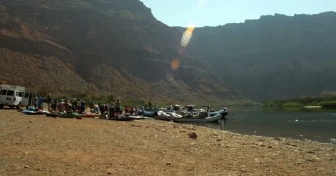 White water Rafters prepare to launch from Lee's Ferry into the Colorado River Stock Footage 77629724