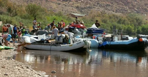 White water Rafters prepare to launch from Lee's Ferry into the Colorado River 4 Stock Footage 77630479