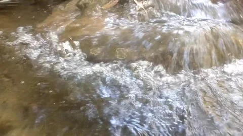 White Water Rapids Flowing Over Rocks 스톡 동영상 334663108