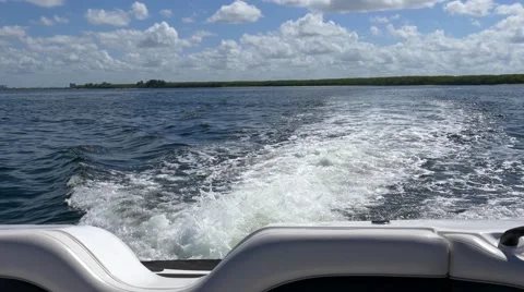 White-water wake created from boat engine on open water, 4K Stock Footage 50555822