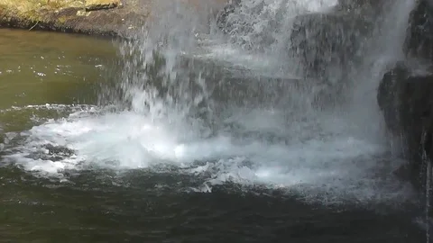 White waterfall pouring into river (close-up) Stock Footage 92576354