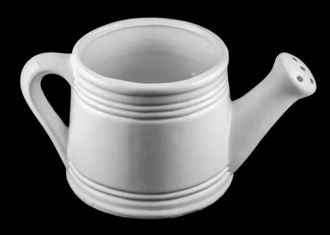 White watering can, watercan, sprinkler, close up, isolated, black background Stock Photos
