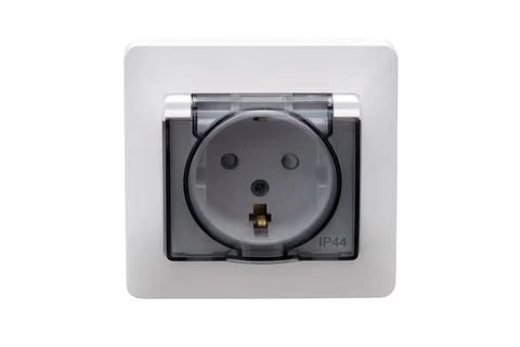 White waterproof electric wall socket with protective cover for outdoor use.  Stock Photos