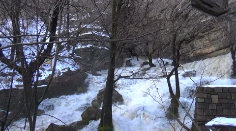 White waters of a torrential waterfall in the winter stock video footage Stock Footage 59102443