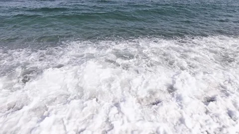White waves in the blue sea on the beach. Video stock 275277161
