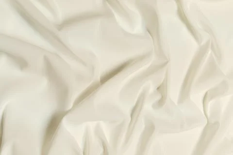 White wavy fabric texture background. Abstract linen cloth soft waves. Silk Stock Photos