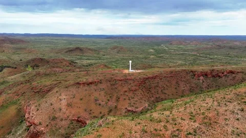 White weather radar Tower Red Desert Landscape with Mount Isa City in distance Stock-Footage 328034017